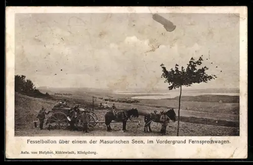 AK Fesselballon des deutschen Heeres über einem der Masurischen Seen, im Vordergrund Fernsprechwagen