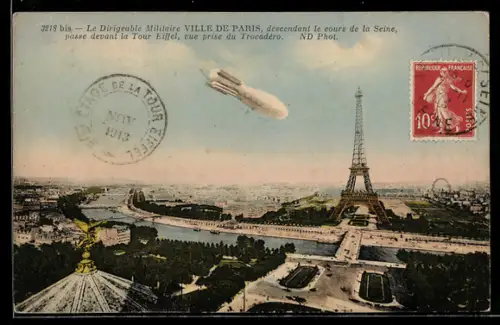 AK Paris, Militär-Zeppelin im Fluge über der Stadt nahe dem Eiffelturm