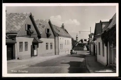AK Wien, Grinzing, Strasse mit Häusern und Kirche
