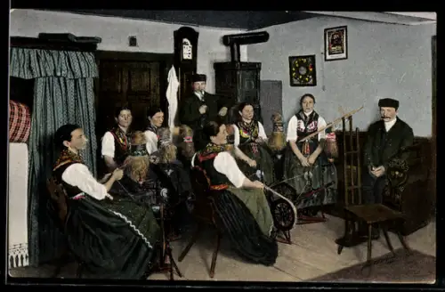 AK Bellings, Spinnstube mit einer Gruppe von Frauen und zwei Männern