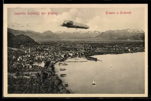 AK Bregenz a. Bodensee, Zeppelins Luftschiff über dem Ort mit Bergpanorama