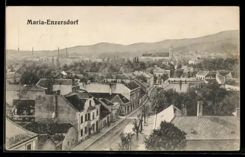 AK Maria-Enzersdorf, Panorama mit Strasse und Kirche