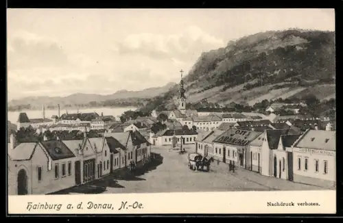 AK Hainburg a. d. Donau, Strassenpartie mit Kirche und Donau-Panorama, Leopold Ott`s Bäckerei