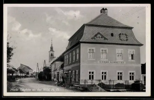 AK Markt Göpfritz an der Wild, Hauptstrasse mit Kirche, Handlung von Oskar Albrecht