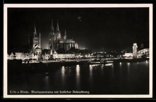 AK Köln a. Rhein, Rheinpanorama mit Dom bei Nacht