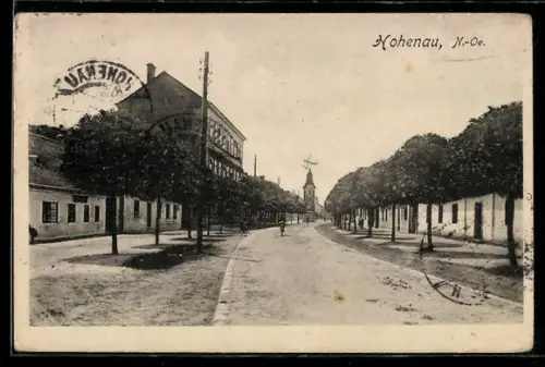 AK Hohenau /N.-Oe., Hauptstrasse mit Kirche