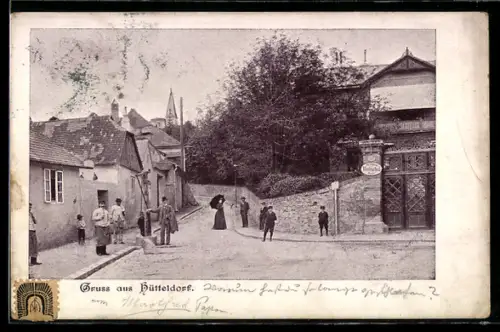 AK Hütteldorf, Strassenansicht mit Häusern und Passanten