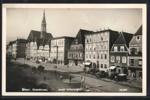 AK Steyr /Oberdonau, platz mit Geschäften und Kirche