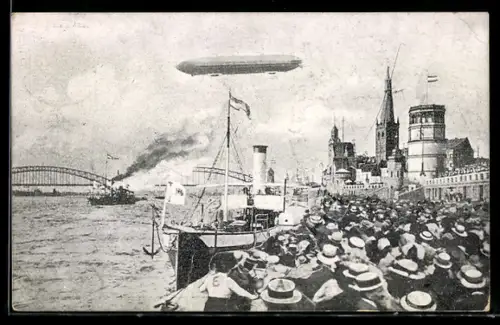 AK Düsseldorf, Zeppelin fliegt über Menschenmenge am Hafen