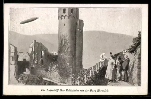 AK Rüdesheim, Ein Zeppelin über der Stadt mit Burg Ehrenfels
