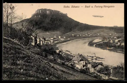 AK Königstein /Sächs. Schweiz, Zeppelin beim Überqueren des Ortes mit Festung