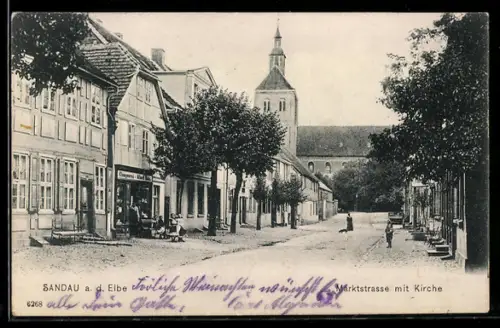 AK Sandau a. d. Elbe, Partie in der Marktstrasse mit Blick zur Kirche