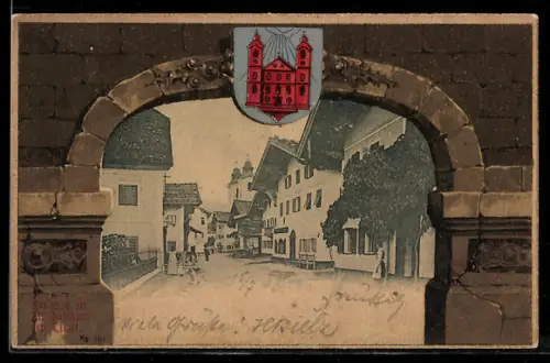 Passepartout-AK St. Johann, Strassenpartie mit Gebäudeansicht durch Tor mit Wappen