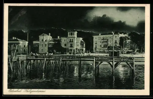 AK Heiligendamm, Ortsansicht mit Seebrücke bei Gewitterstimmung