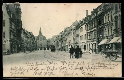 AK Gera, Heinrichstrasse mit Café und Geschäften, Strassenbahn