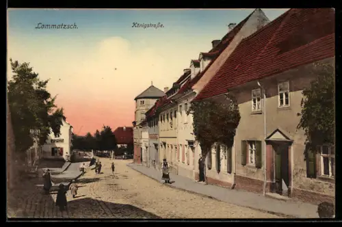 AK Lommatzsch, Königstrasse mit Wohnhäusern und Warenlager
