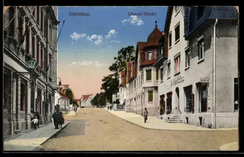 AK Herrnhut, Löbauer Strasse mit Lederwarengeschäft