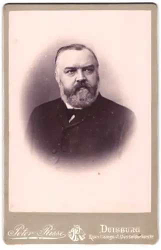 Fotografie Peter Risse, Duisburg, Ecke Königs- & Düsseldorferstr, Porträt von Ludwig Müller, geb. 1836, gest. 1894