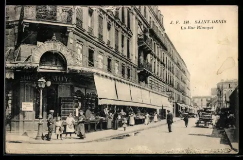 AK Saint-Denis, La Rue Blanqui avec le Magasin de Julien Damoy