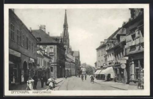 AK Offenburg, Hauptstrasse mit Geschäften und Kirche
