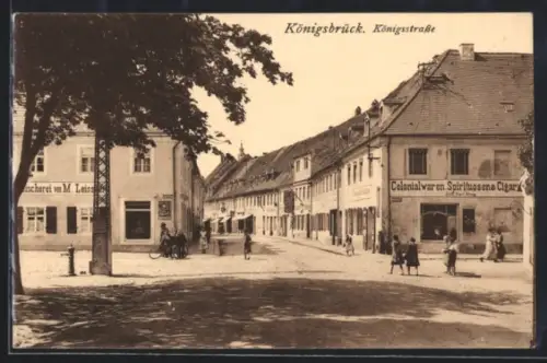 AK Königsbrück, Partie in der Königsstrasse mit Geschäft von Karl Krug