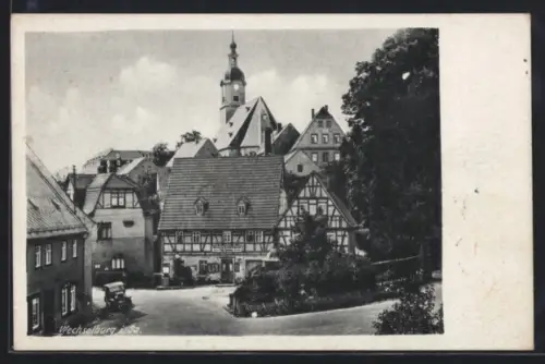 AK Wechselburg i. Sa., Strassenpartie mit Kirche