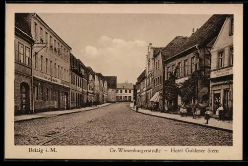 AK Belzig, Grosse Wiesenburgerstrasse mit Hotel Goldener Stern
