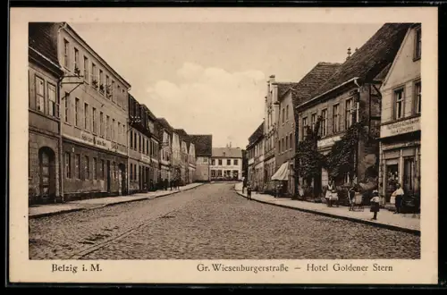 AK Belzig, Grosse Wiesenburgerstrasse mit Hotel Goldener Stern