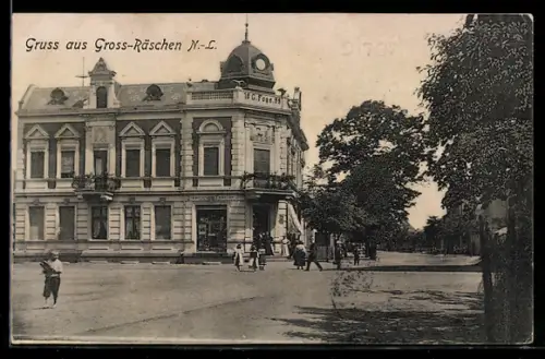 AK Gross-Räschen /N.-L., Strassenpartie mit Geschäft