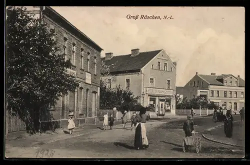 AK Gross Räschen /N.-L., Strassenpartie mit Warengeschäft von S. Spiro