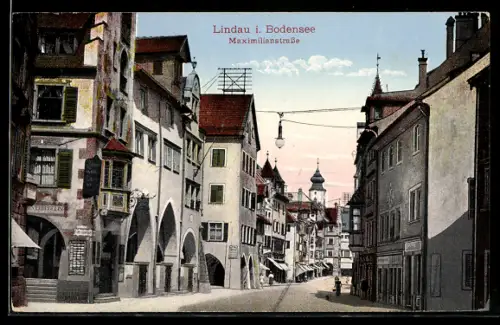 AK Lindau i. Bodensee, Maximilianstrasse mit Geschäften u. Kirche