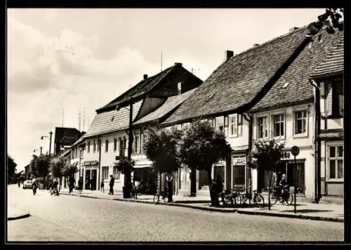 AK Wusterhausen /Dosse, Karl-Marx-Platz mit Geschäften