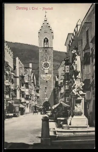 AK Sterzing i. Tirol, Neustadt, Strassenpartie mit Geschäft und Tor