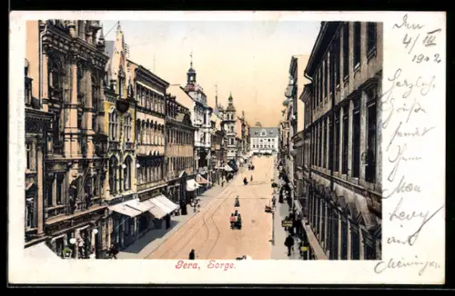 AK Gera, Sorge, Strassenszene mit Geschäften und Blick zum Rathaus