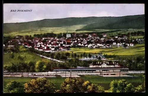 AK Bad Pyrmont, Panorama mit Bahnhof