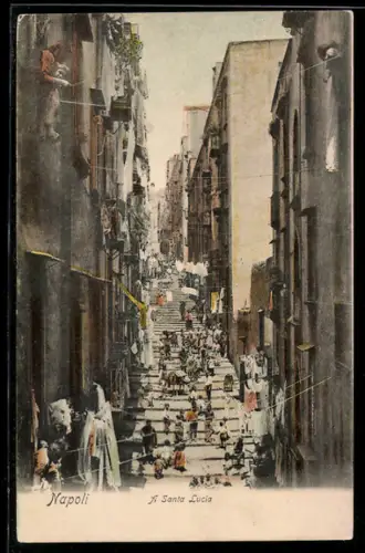 AK Napoli, A Santa Lucia, scala affollata con persone e panni stesi tra gli edifici