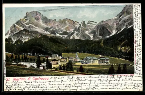 AK S. Martino di Castrozza, Veduta panoramica delle montagne e del villaggio alpino