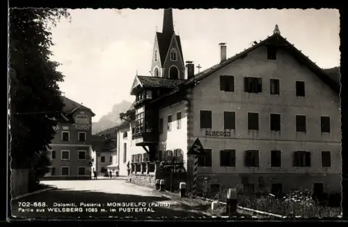 AK Monguelfo, Vista del villaggio con chiesa e albergo nel Pustertal