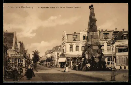 AK Norderney, Kniephausen Strasse mit Kaiser Wilhelm-Denkmal