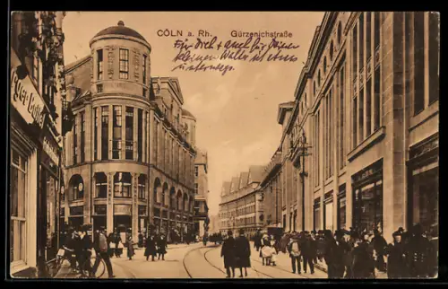 AK Cöln a. Rh., Gürzenichstrasse, Strassenszene, Geschäftsgebäude, Passanten