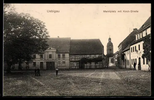 AK Uebigau, Partie am Marktplatz mit Kirch-Strasse