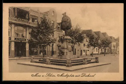 AK Moers a. Rhein, Marktplatz Ecke Neustrasse mit Kaufhaus Jul. Korfhäuer und Denkmal