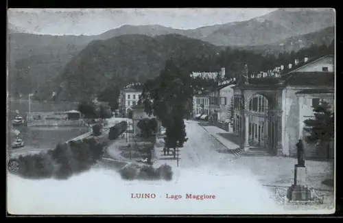 AK Luino /Lago Maggiore, Strassenpartie am See mit Denkmal