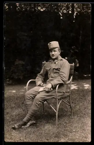 AK Österreichischer Soldat in Uniform mit Orden, Eisernes Kreuz