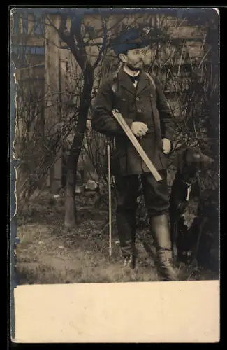 Foto-AK Jäger mit Gewehr neben seinem Jagdhund