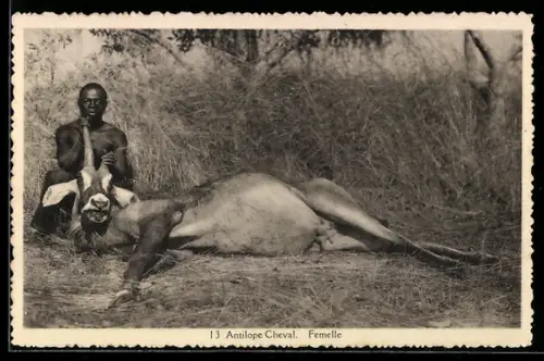 AK Mann mit einer erlegten Antilope