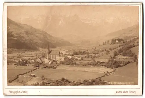 Fotografie Würthle & Sohn, Salzburg, Ansicht St. Johann i. P., Ortsansicht mit Kirche gegen die Berge