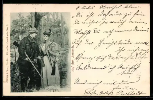 AK Jäger und Jägerin mit Gewehren vor einem Baum