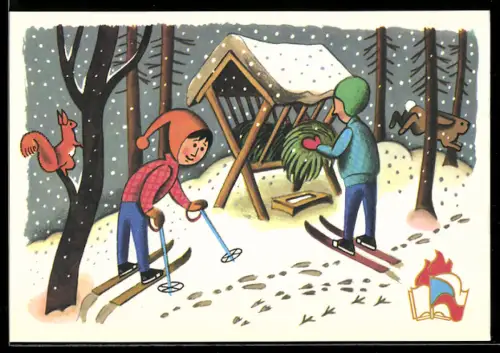 AK Kinder befüllen eine Heuraufe im Winter