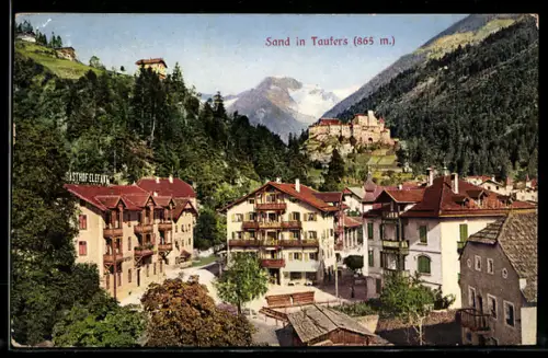 AK Sand /Taufers, Vista del villaggio con castello in lontananza nelle Alpi